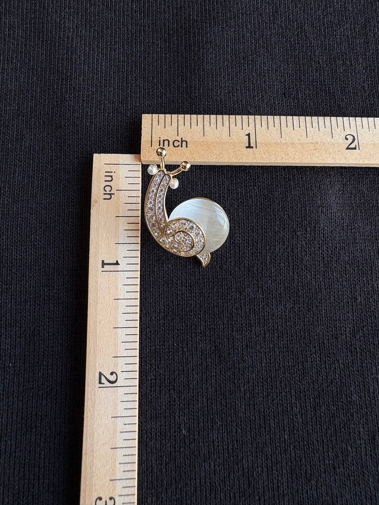 Snail brooch