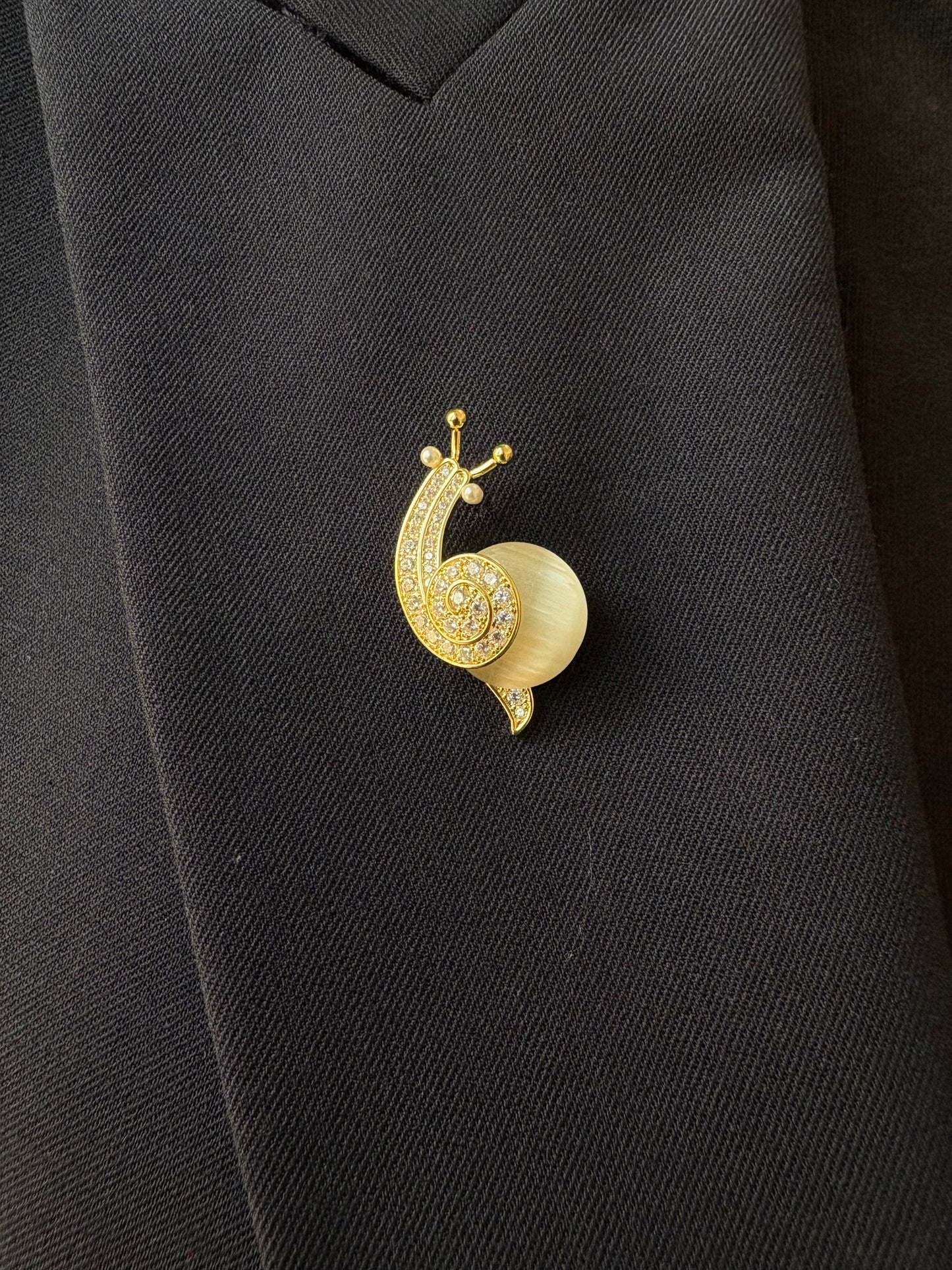 Snail brooch